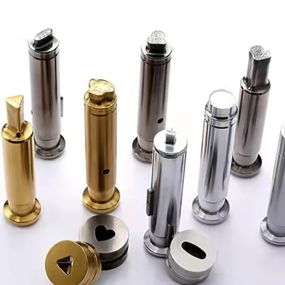 Punches and dies in different shapes, steel and brass